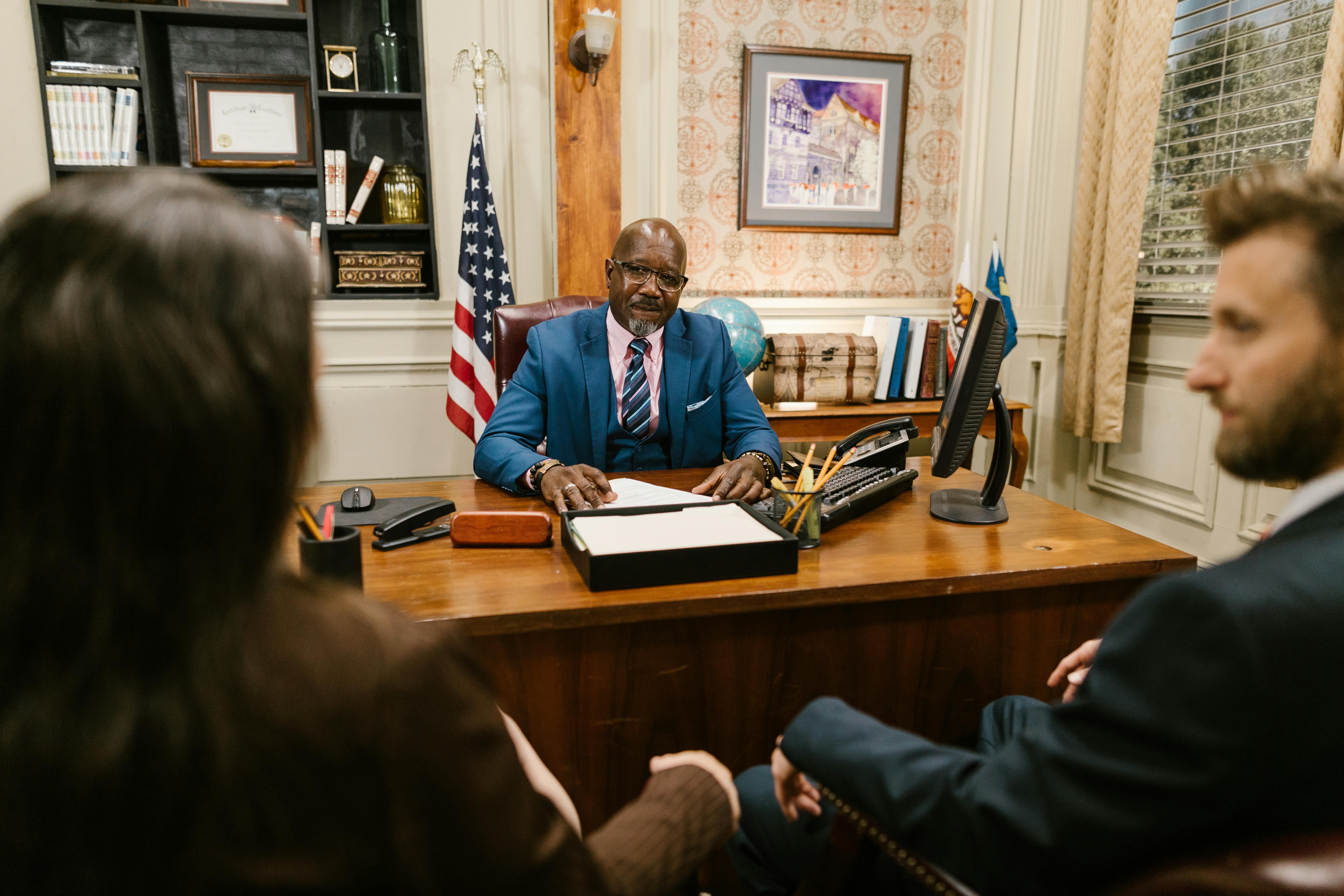 Patent attorney reviewing research with a client